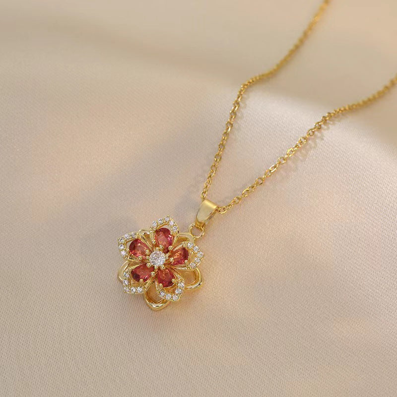 Wholesale Necklace rotating bauhinia zircon flower pendant temperament titanium steel necklace