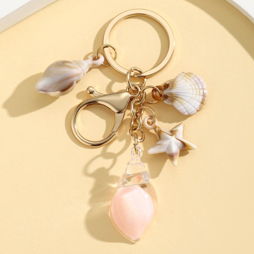 Wholesale Seaside vacation luminous conch Acrylic keychain