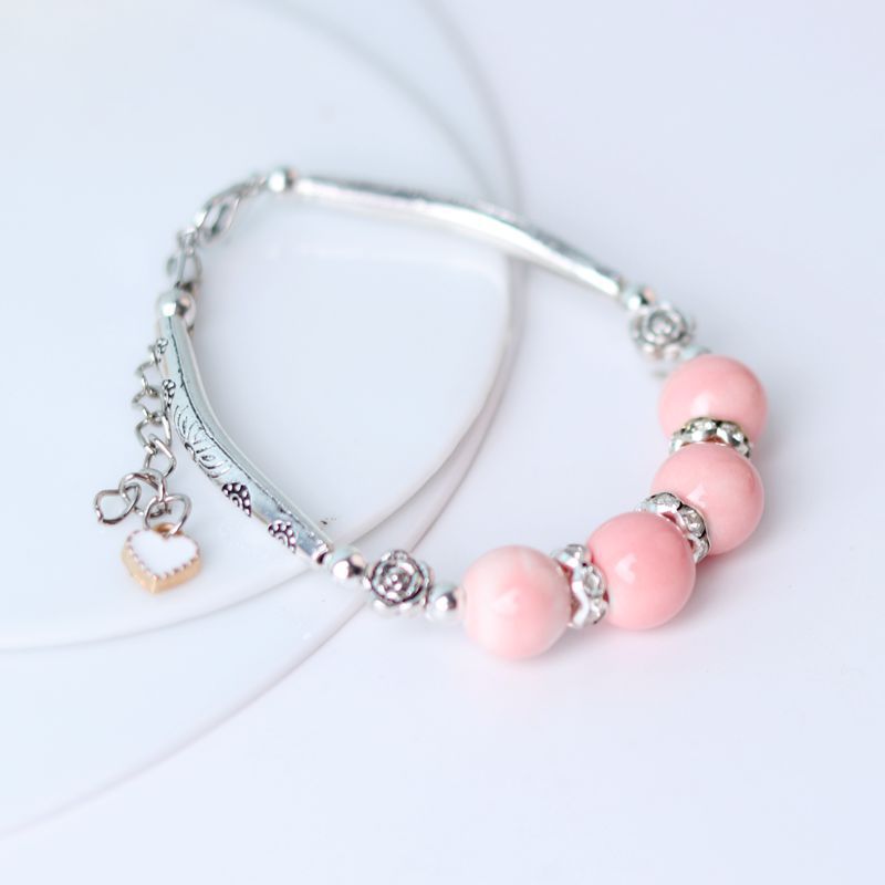 Tubo de curvatura al por mayor cuentas de cerámica pulsera de cuerda hecha a mano