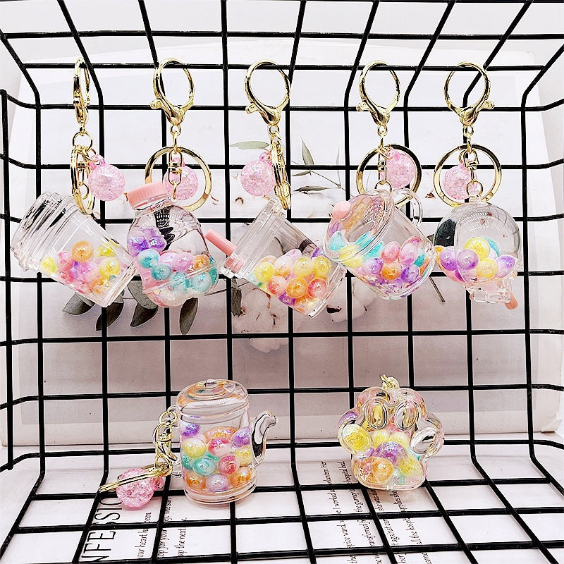 Botella de deriva acrílica al por mayor cuentas coloridas de botella y cadena de llave de botella