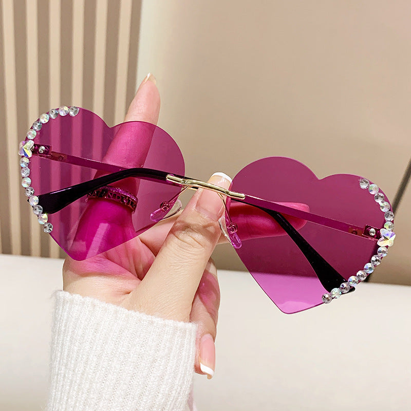Wholesale Travel Driving Metal Heart Frameless Cut Edge Diamond Heart Sunglasses