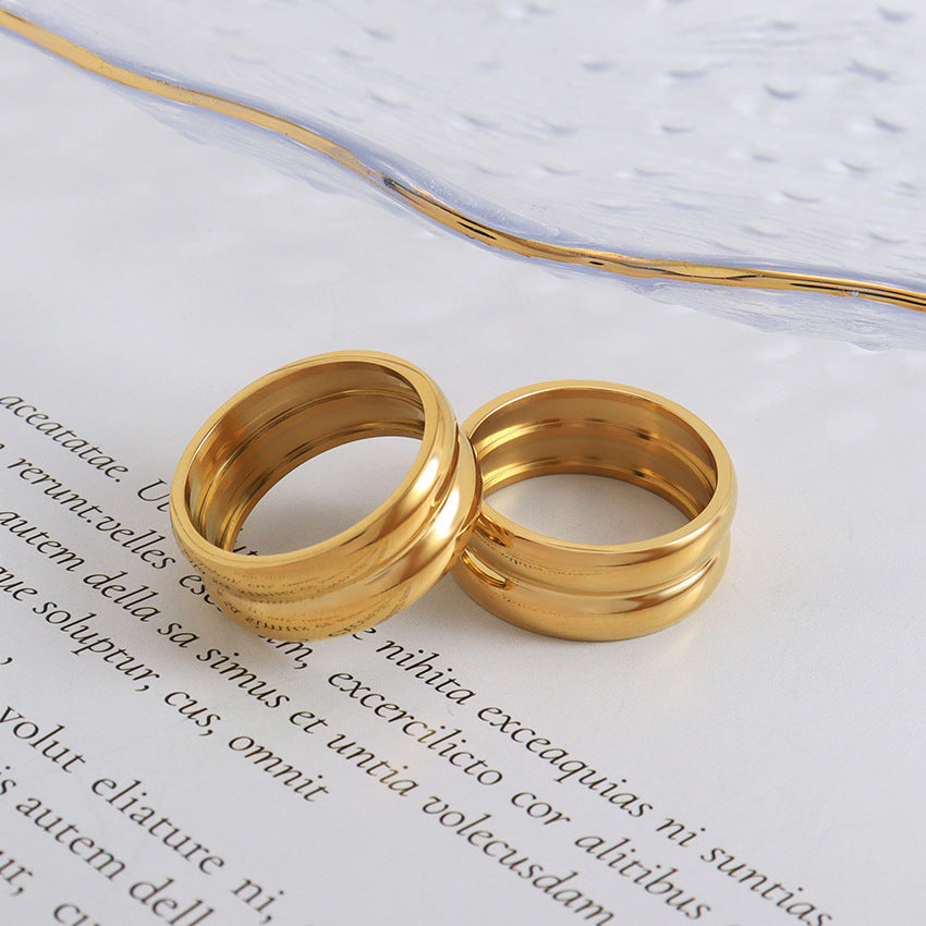 Wholesale Inlaid Pear-shaped Zircon Titanium Steel Thin Circle Open Ring