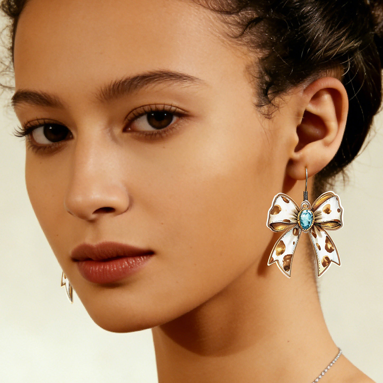 Wholesale Modern Leopard Cow Print Bowknot Acrylic Pendant Earrings For Everyday Party Wear Boutique Resale