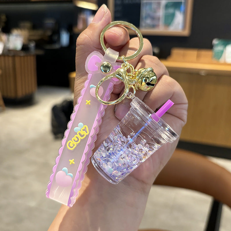 Wholesale quicksand luminous cup keychain liquid oil drift bottle pendant