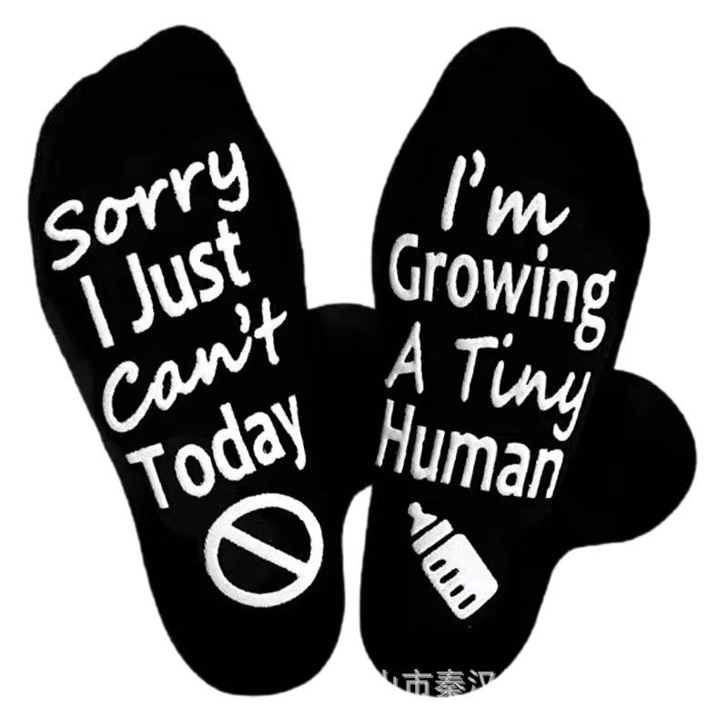 Wholesale of European and American Cotton Medium Cylinder Letter Anti Slip Adhesive Socks