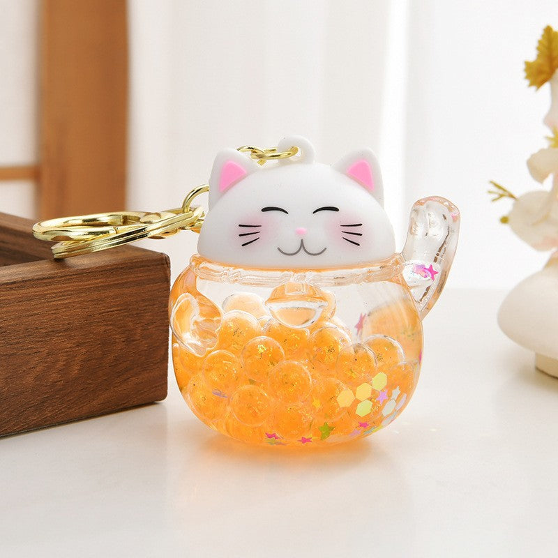 Wholesale Acrylic flowing sand bottle bag keychain