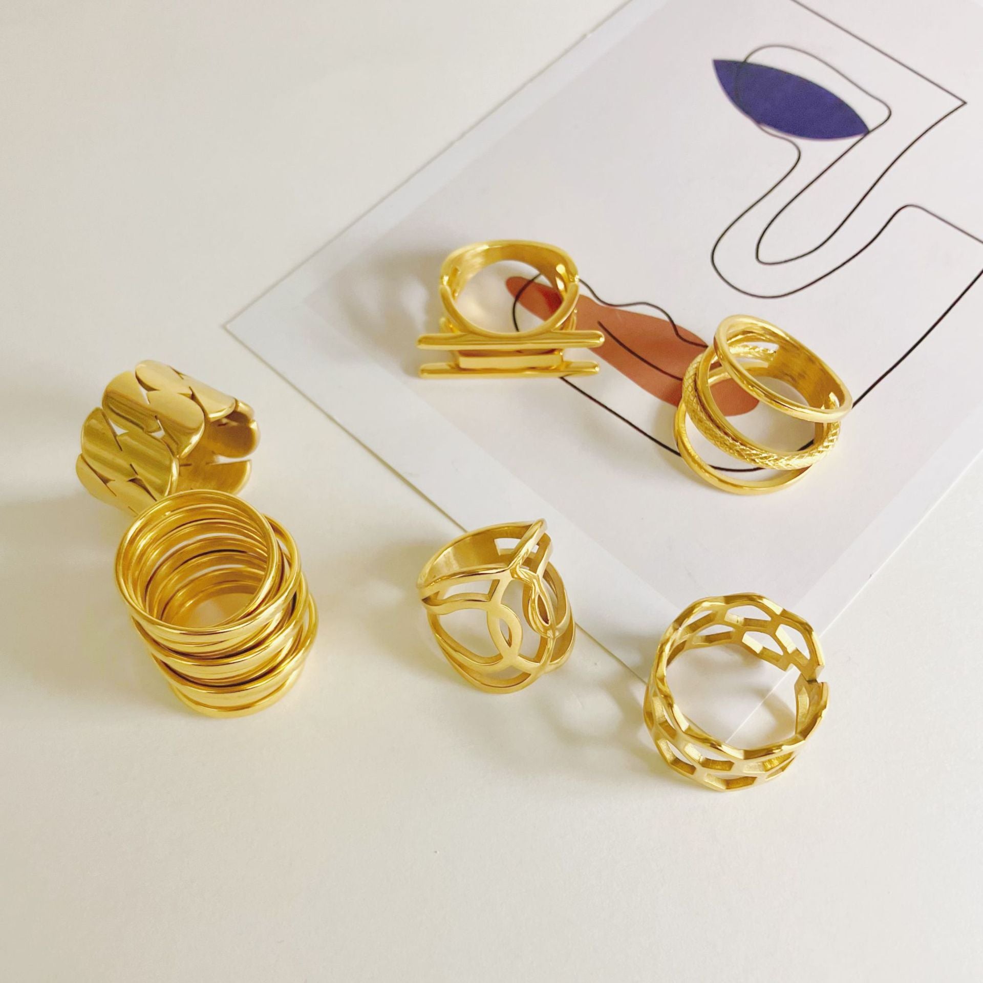 Recubrimiento de oro de anillo geométrico de acero inoxidable al por mayor