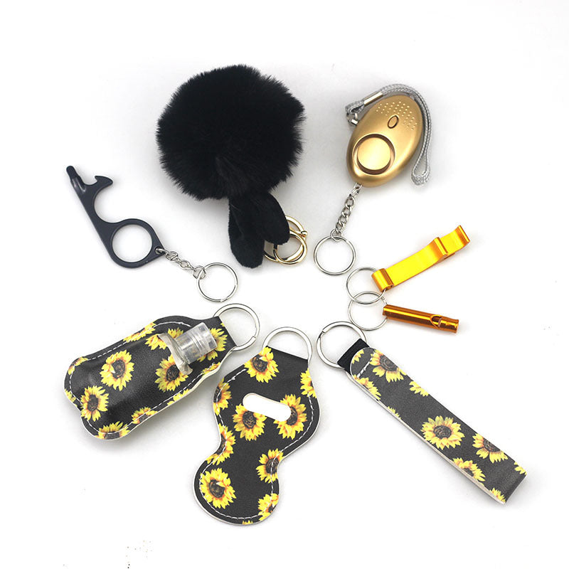 Wholesale Outdoor Whistle Hand Sanitizer Leather Case Fur Ball Key Chain Set