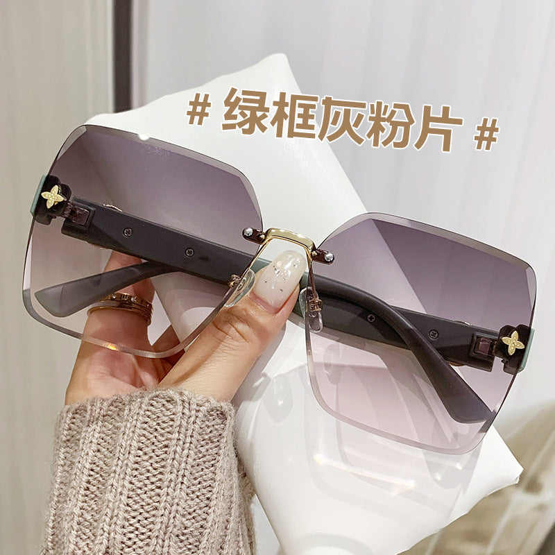 Wholesale Frameless Trimmed Trendy Sunglasses