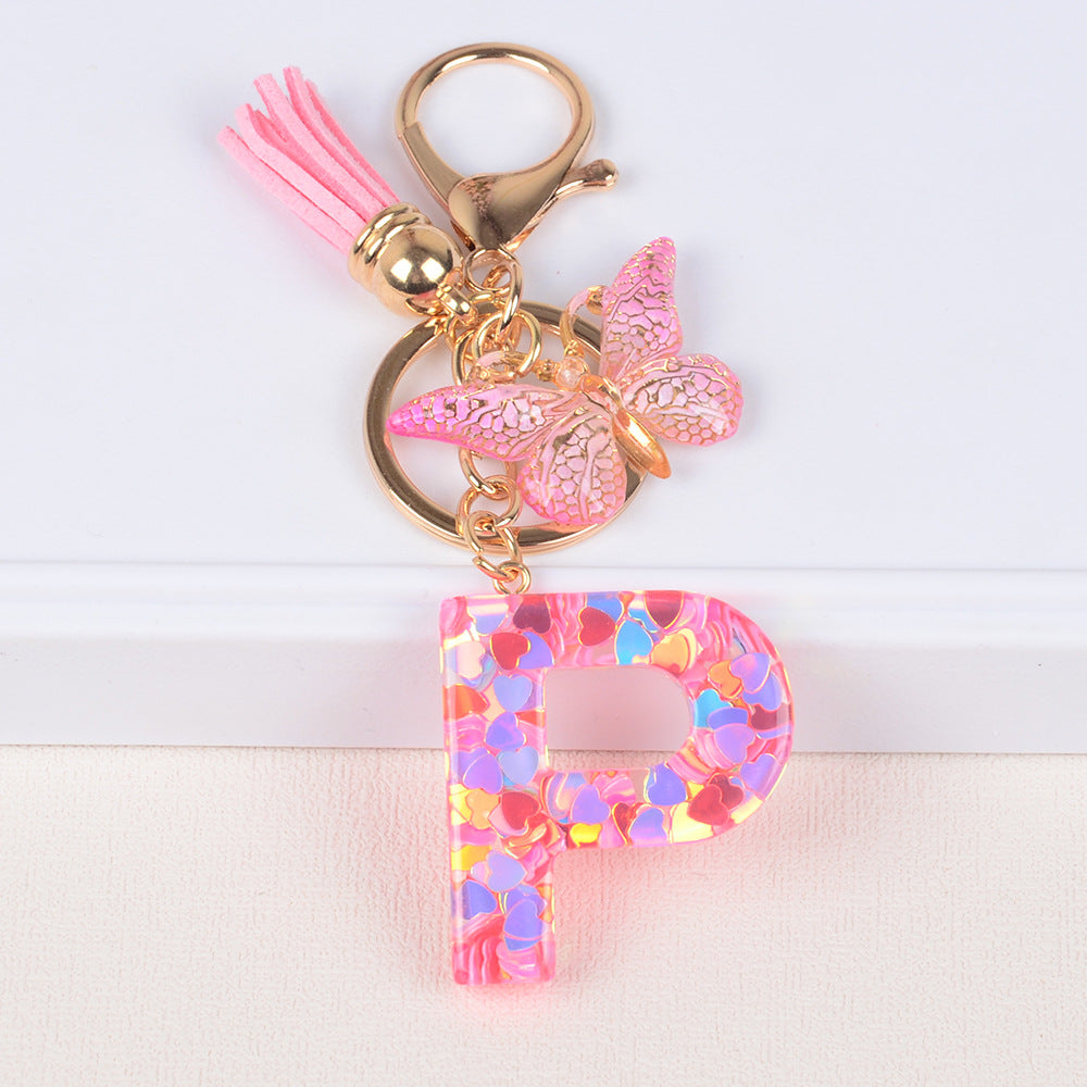 卸売ピンクタッセルバタフライグリッターレター樹脂キーホルダー