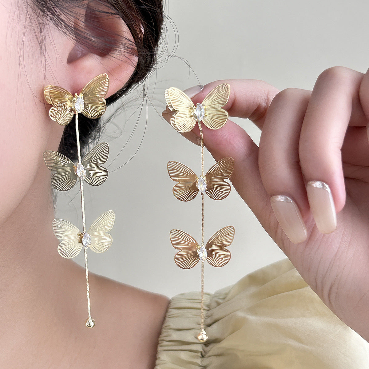 Wholesale Silver Needle Metal Style Three-Dimensional Bow Tassel Earrings