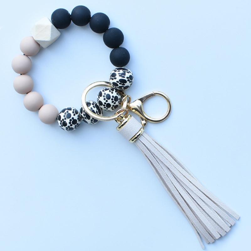 Wholesale Colorful leopard print silicone beaded bracelet keychain PU tassel pendant