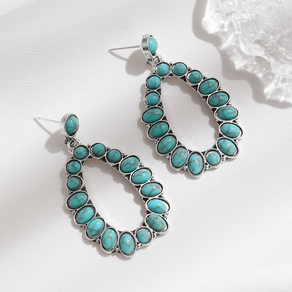 Wholesale Exaggerated retro oval turquoise teardrop-shaped hollow earrings