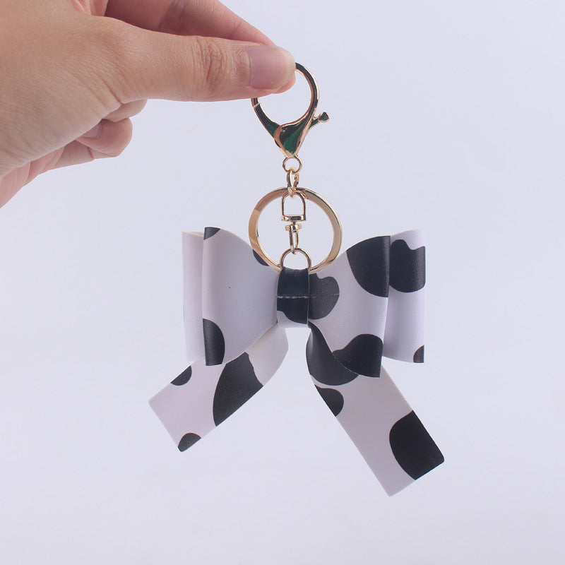 Wholesale Cartoon Aztec Color Bow Leather Keychain