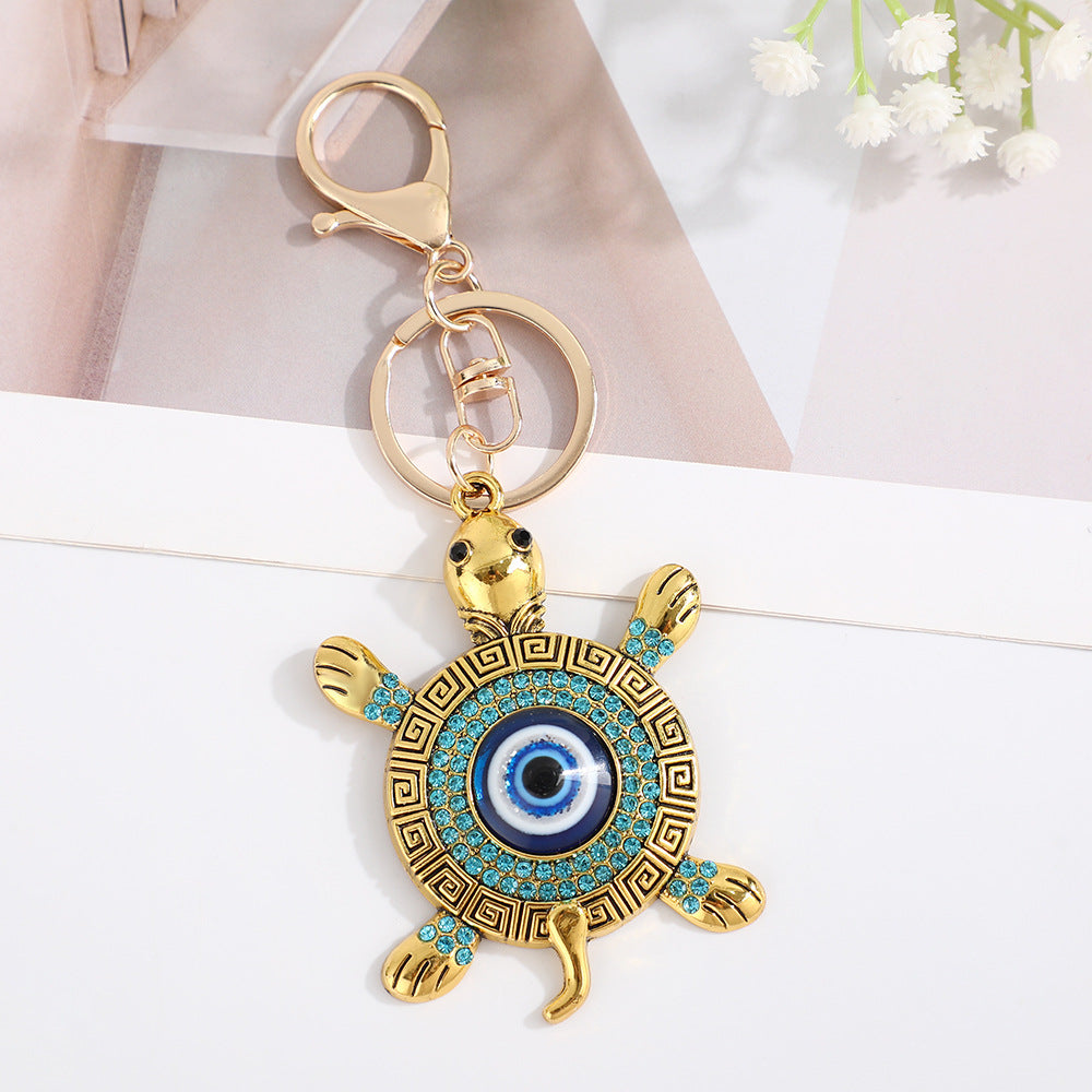 Wholesale Devil' s Eye Turtle Blue Eyes with Water Diamond Metal Keychain