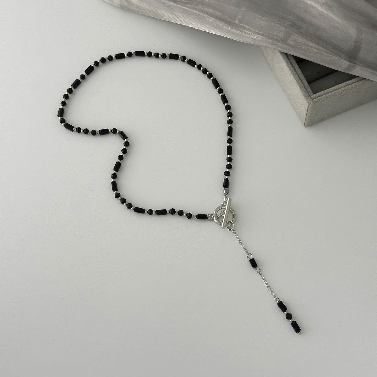 Wholesale Black crystal ot-clasp heart-shaped tassel necklace