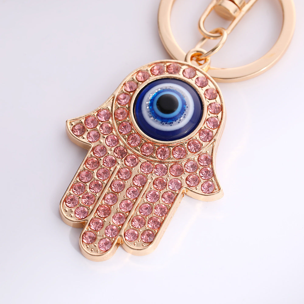 Wholesale Palm Devil' s Eye with Water Diamond Metal Keychain