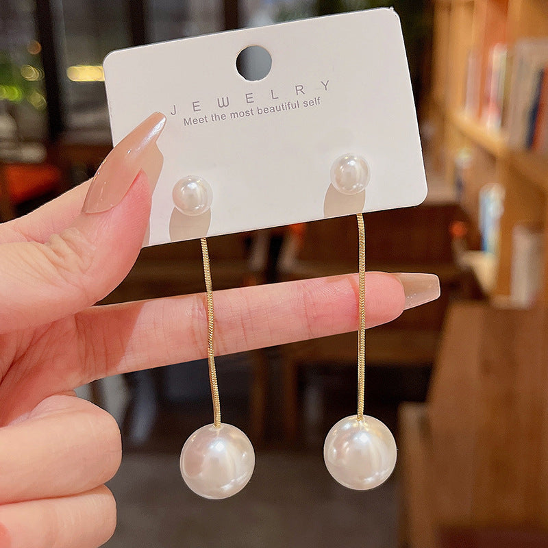 Wholesale of Long Tassel Pearl Alloy Earrings