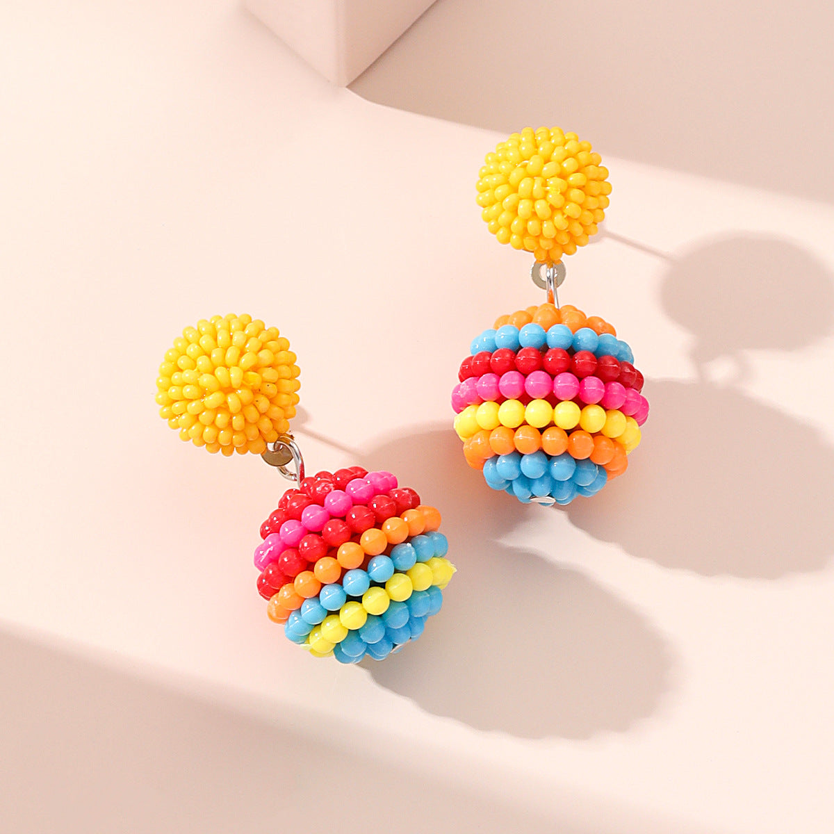 Wholesale of New Ball Small Fresh Colored Resin Earrings