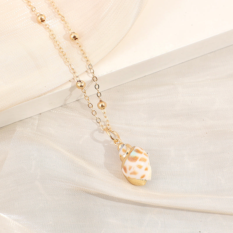 Wholesale Gold-edged Conch and Seashell Necklace