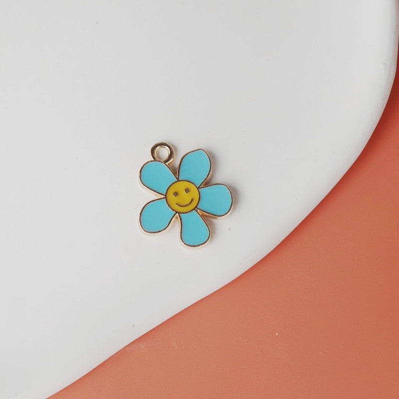 Wholesale smiley face flower oil drop alloy accessories Pendant