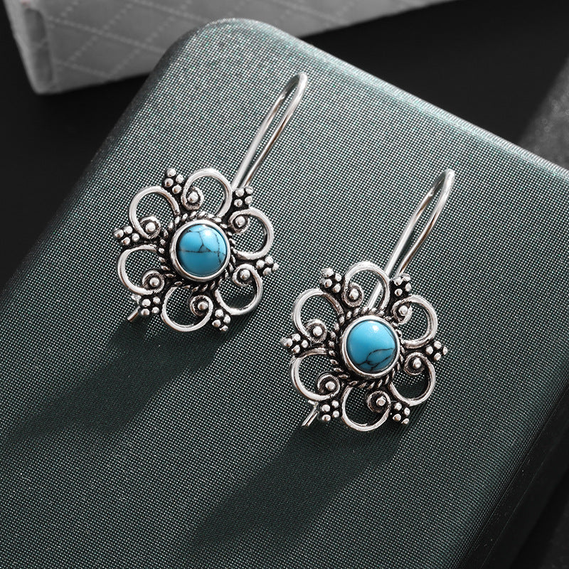 Wholesale Openwork turquoise inlaid earrings