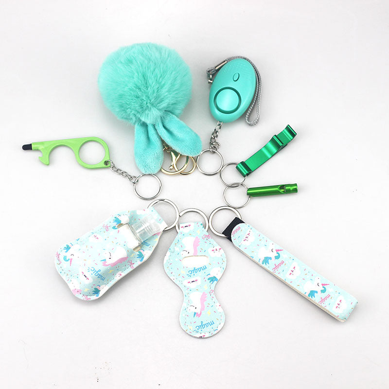 Wholesale Outdoor Whistle Hand Sanitizer Leather Case Fur Ball Key Chain Set