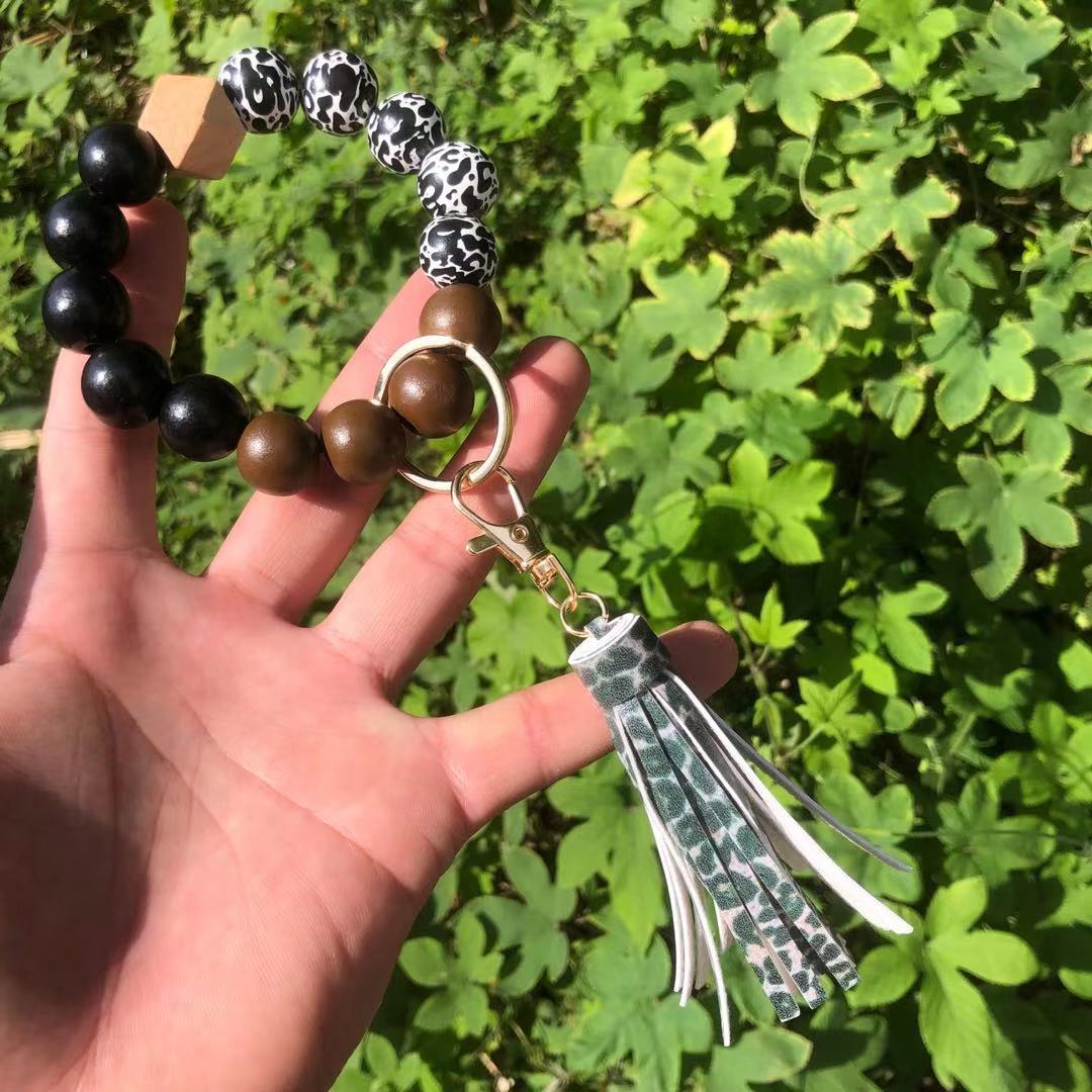 Wholesale Christmas Wooden Beads Plaid Leopard Print PU Tassel Bracelet Keychain