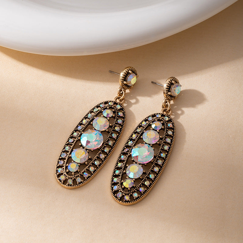Wholesale Retro Western Bohemian Hollow Long Drop Earrings Alloy With Turquoise Inlay Boutique Resale Jewelry Accessory