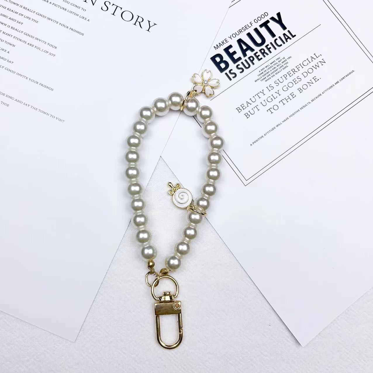Wholesale Beauty Head Pearl Keychains