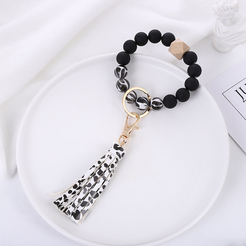 Wholesale Acrylic Beads Wooden Beads PU Tassel Bracelet Keychain