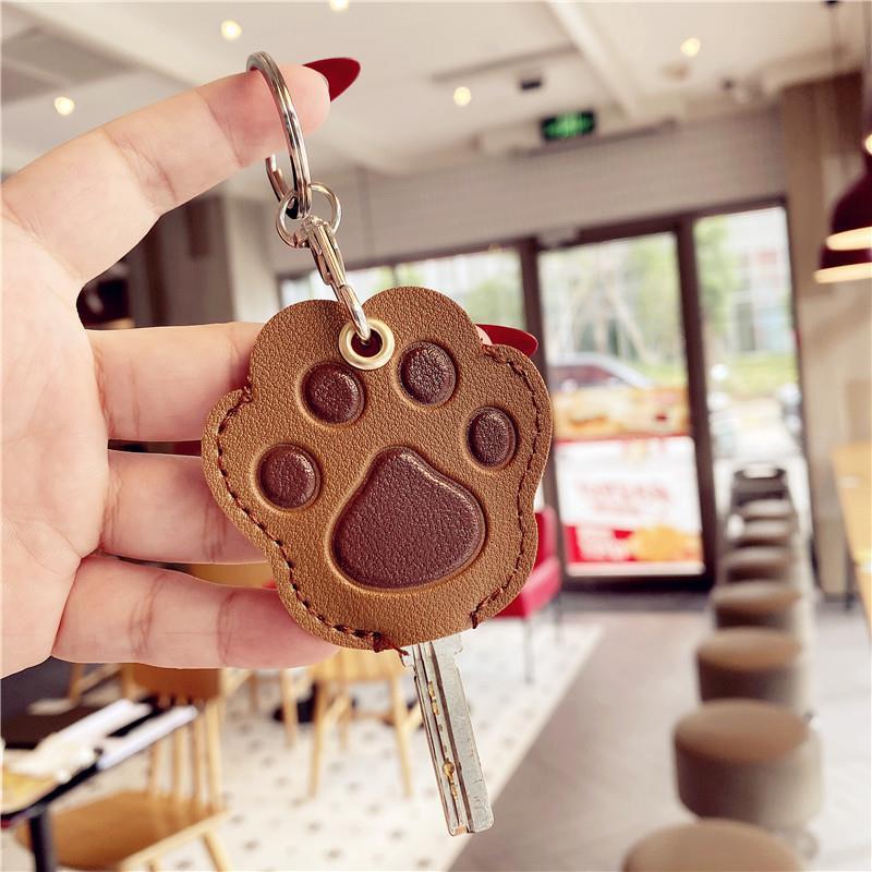 Titular de la llave de la garra del gato de dibujos animados de PVC al por mayor