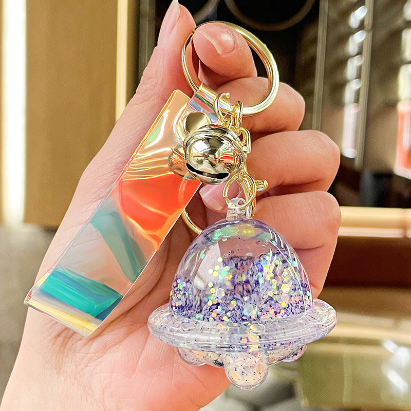 Wholesale Acrylic Fueled Spaceship Astronaut Luminous Quicksand Bottle Keychain