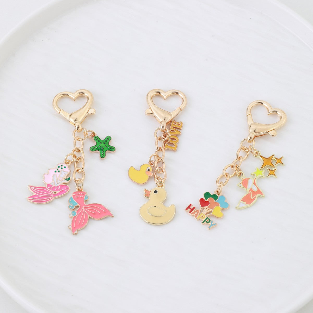 Wholesale Heart duck mermaid metal keychain
