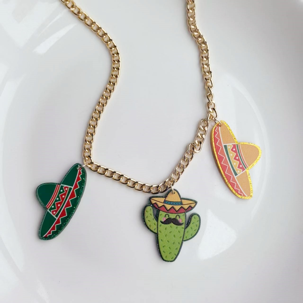 Wholesale Carnival Chili Rainbow Horse Wine Bottle Ghost Hat Sand Hammer Acrylic Necklace