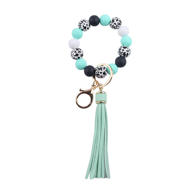 Wholesale Leather Tassel Silicone Beads Wooden Beads Bracelet Keychain