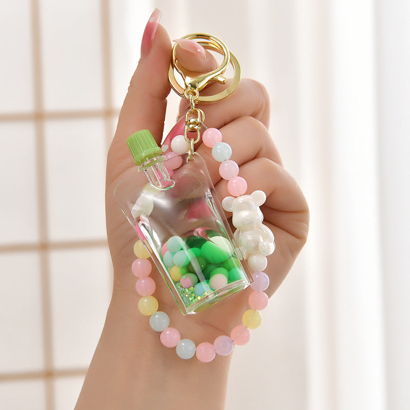 Wholesale Oil Quicksand Bottle Pearl Chain Acrylic Liquid Keychain