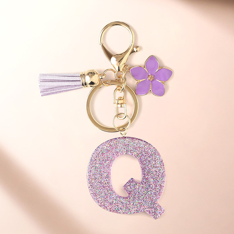 Wholesale Sparkling Pink 26 English Letter Purple Flower Keychain