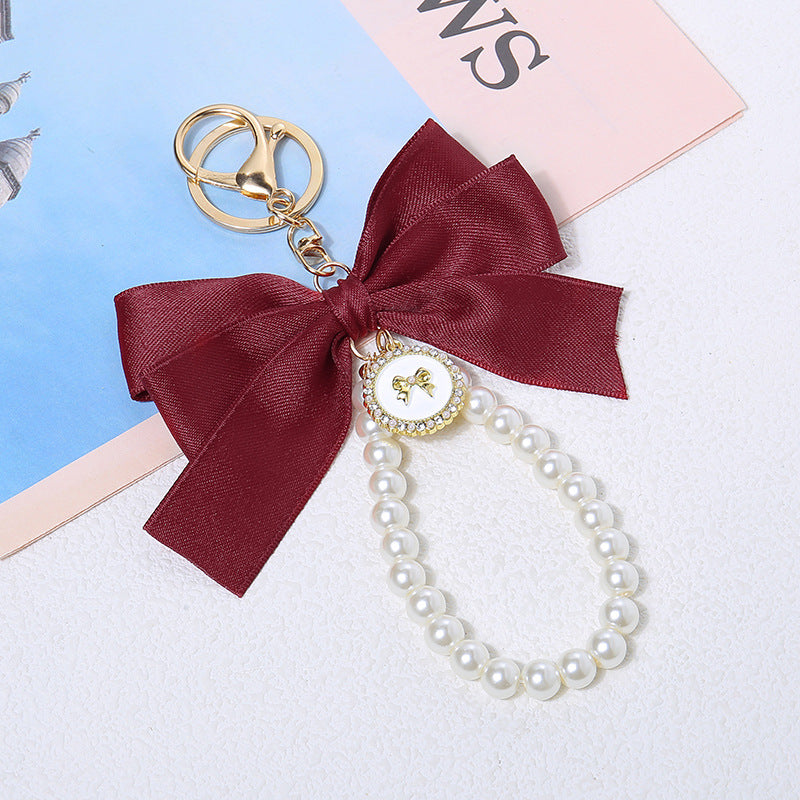 Wholesale New Large Pearl Bow Keychain Pendant Handmade Hair Accessories Ribbon Cloth Knot Accessories Headset Bag Decoration