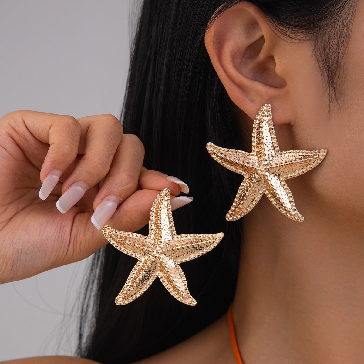Wholesale Exaggerated conch and starfish earrings