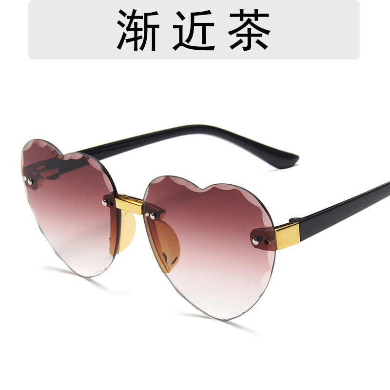 Wholesale Children's Cut Edge Frameless Ocean Film Gradient Peach Heart Sunglasses