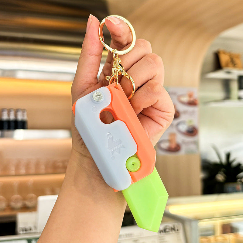 Wholesale Cartoon Quicksand Acrylic Radish Knife Decompression Toy Keychain