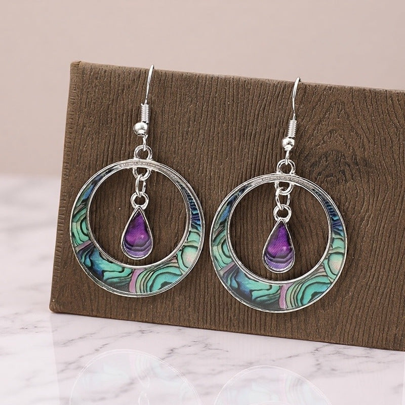 Wholesale Retro Hollow Round Pattern Water Drop Alloy Earrings Bohemian