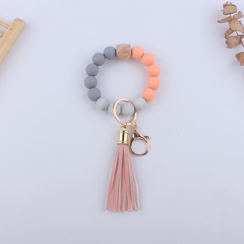 Wholesale Silicone Leather PU Short Tassel DIY Leopard Beaded Bracelet Keychains