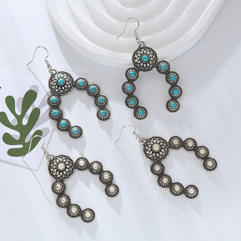 Wholesale Retro alloy inlaid turquoise creative exaggerated temperament earrings
