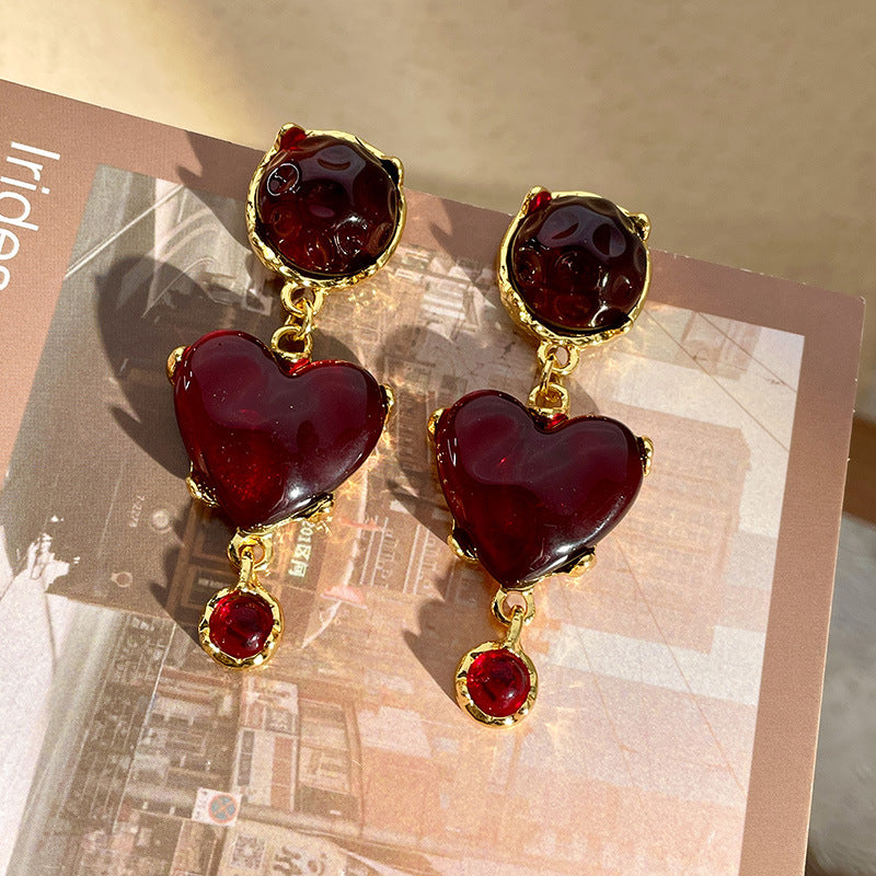 Wholesale of Glazed Red Heart Alloy Earrings
