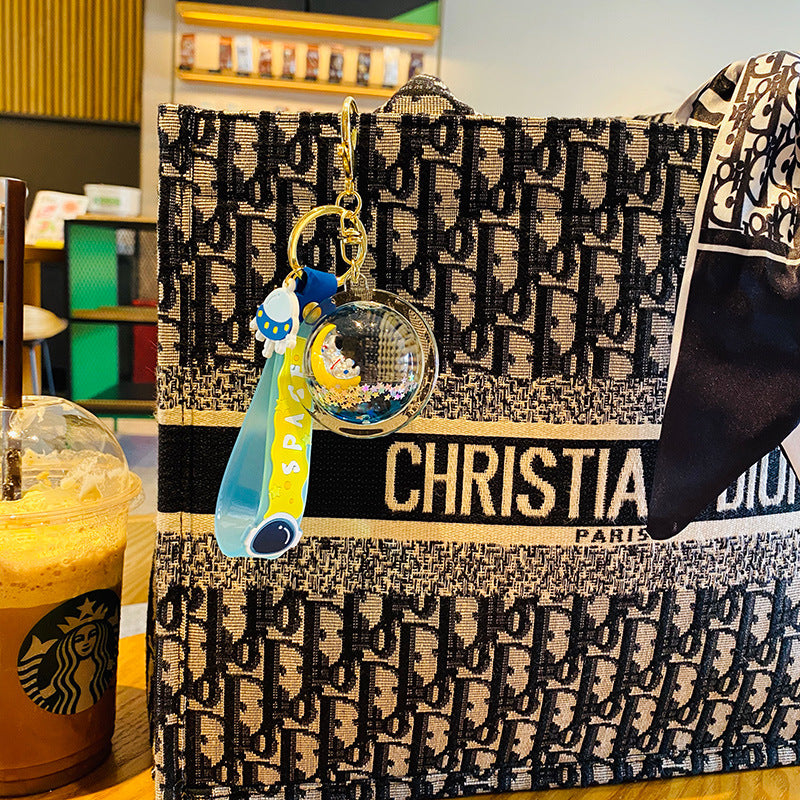 Wholesale Acrylic Creative Liquid Astronaut Floating Keychain