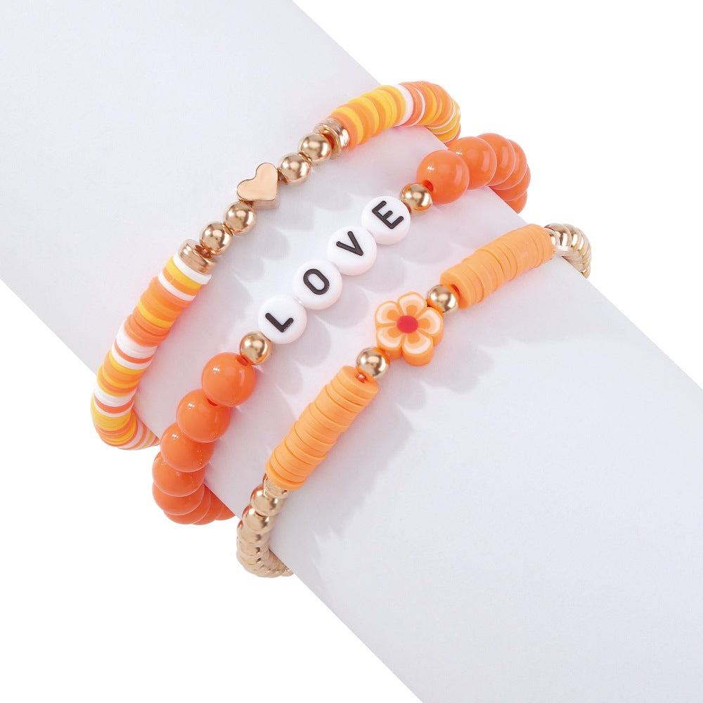 Wholesale Stacked Alphabet Flowers Rice Beads Colored Geometric Bracelet