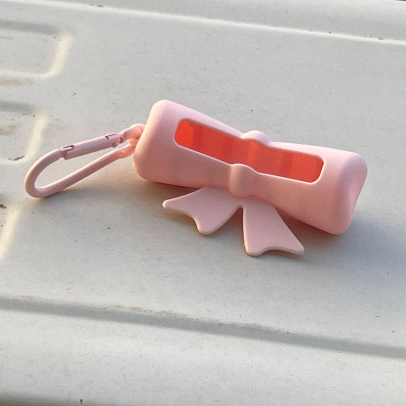 Wholesale Lipstick case silicone protective case bow lipstick bag keychain