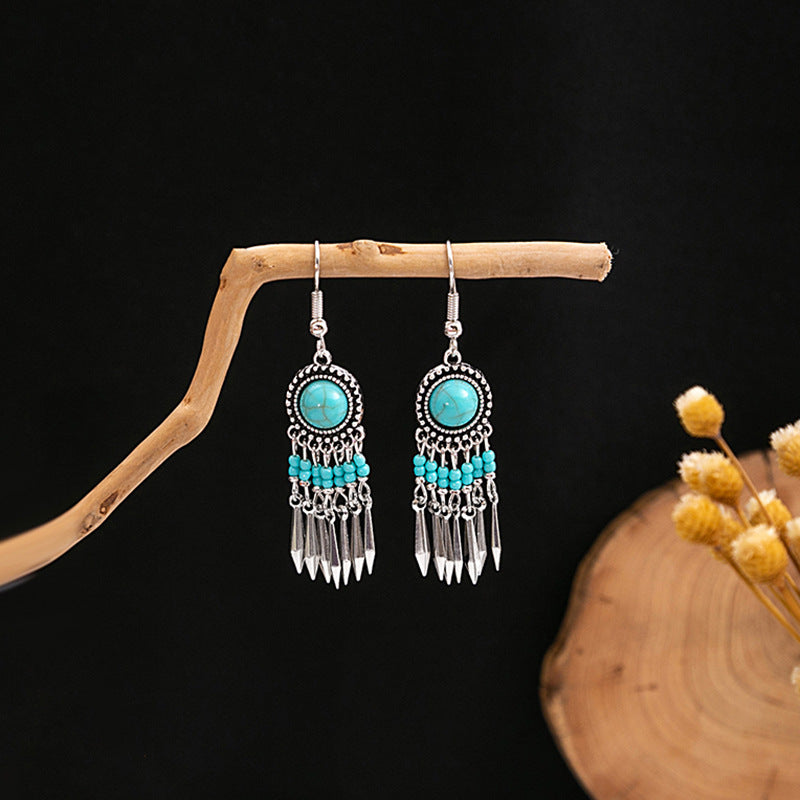 Wholesale Hollow Circular Flower Tassel Alloy Earrings
